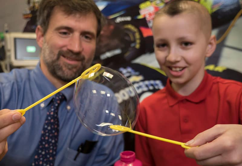 Children's National Health System, Brian Rood with children’s cancer patient