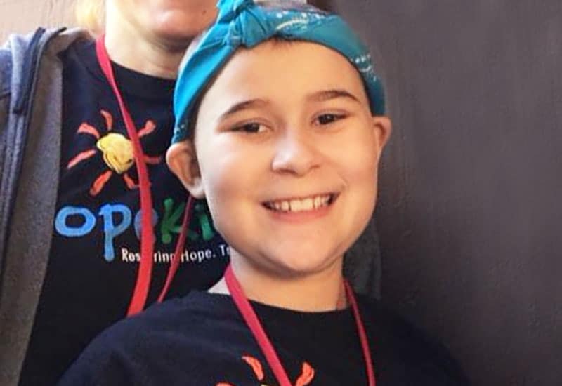 Pediatric cancer survivor, Lila